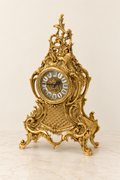 Louis XV style mantel clock with pierced crest