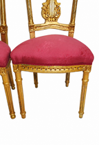 Pair of Gilt Lyre-Back Chairs with Burgundy Upholstery — original seat upholstery and frame detail