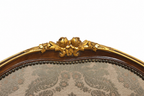 Pair of Louis XV-Style Gilt-Accented Damask Armchairs — original gilt crest detail