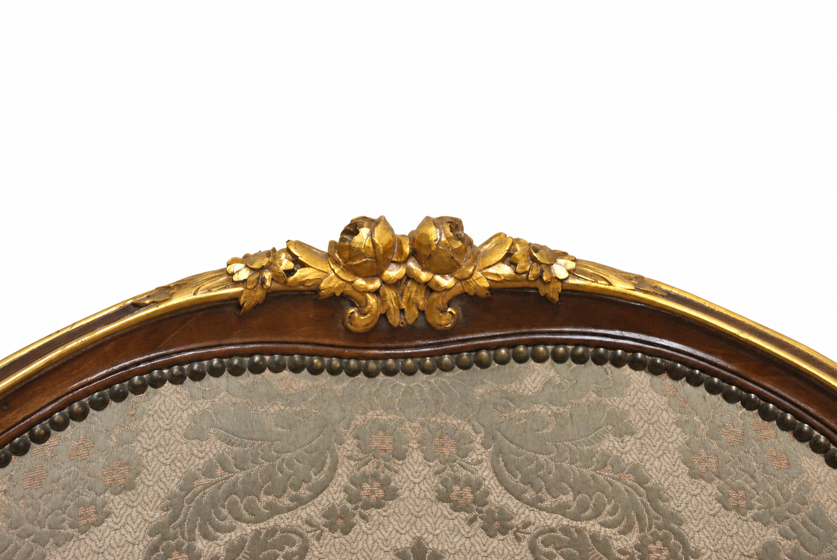 Pair of Louis XV-Style Gilt-Accented Damask Armchairs — original gilt crest detail